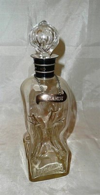 Lot 193 - Brandy decanter with silver collar and label