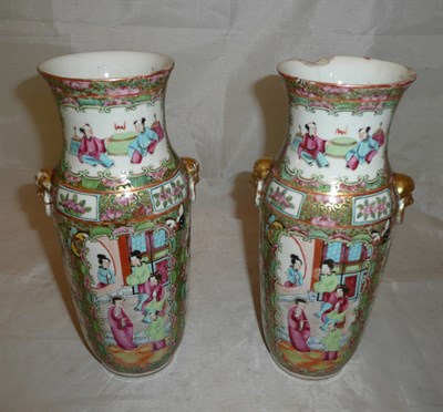 Lot 215 - A pair of Cantonese famille rose vases