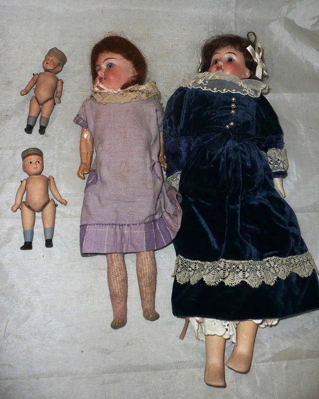 Lot 217 - Two bisque head dolls and two baby boy dolls