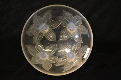 Lot 772 - A René Lalique Lys Opalescent and Clear Glass Bowl, the underside moulded with four lily...