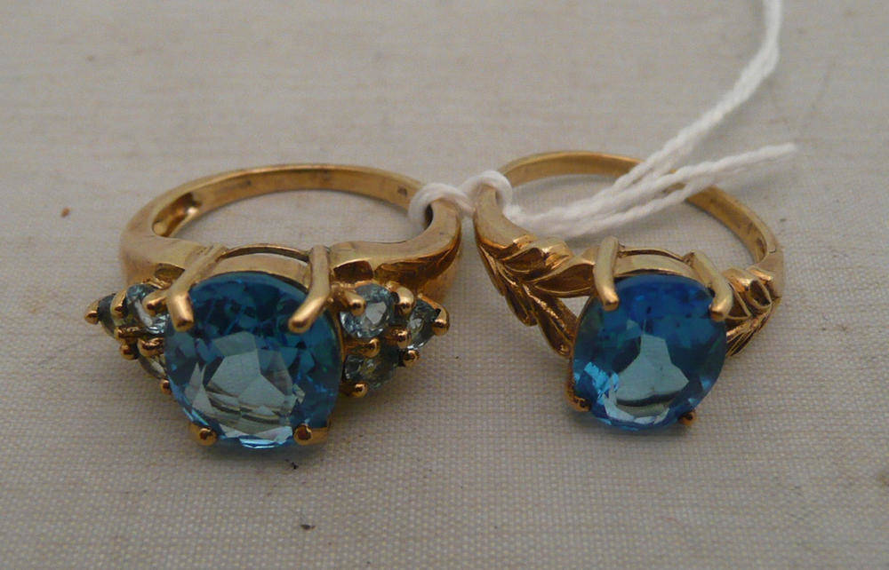 Lot 244 - Two 9ct gold blue topaz rings