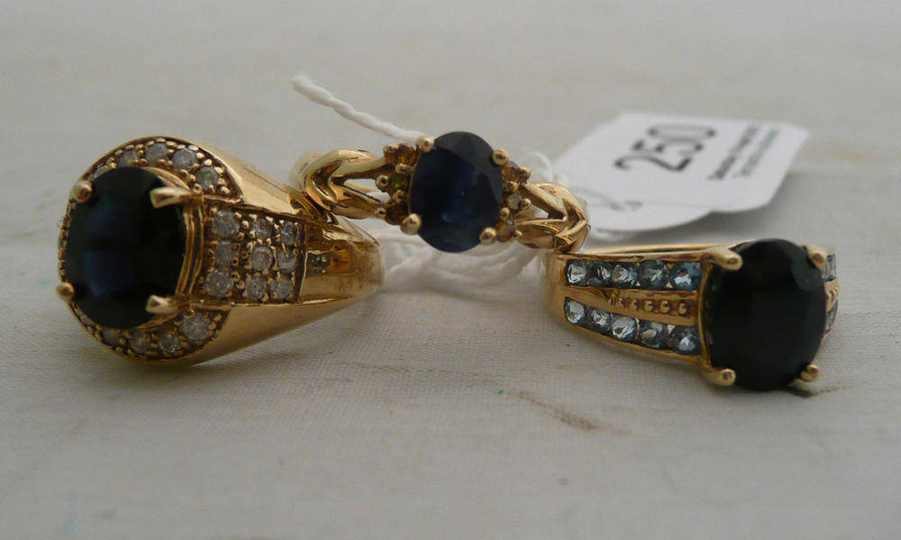 Lot 250 - Two 9ct gold sapphire-set rings and a sapphire ring stamped '9K'