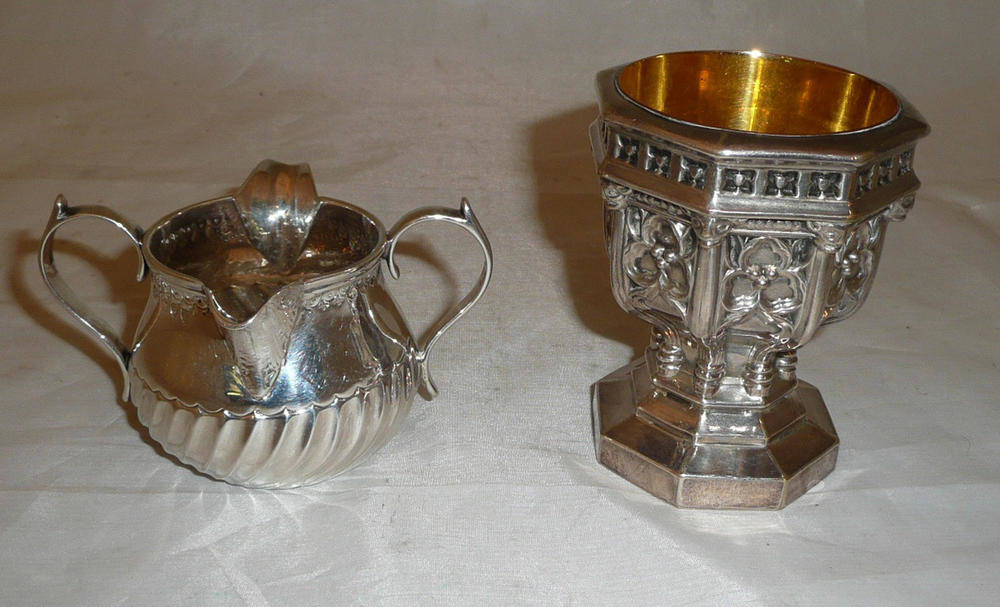 Lot 283 - A white metal font and a silver two lipped jug