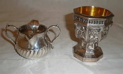 Lot 283 - A white metal font and a silver two lipped jug