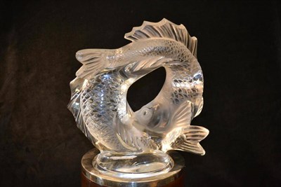 Lot 778 - A Modern Lalique Deux Poissons Clear and Frosted Glass Sculpture, having two fish entwined in...