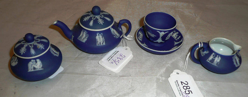 Lot 285 - A miniature Wedgwood teaset - (cup with handle missing)