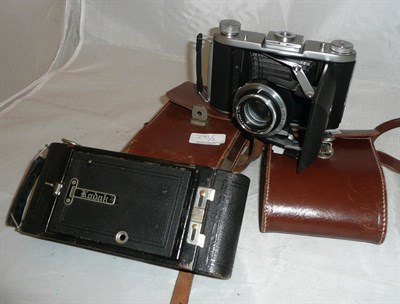 Lot 299 - An Ensign Selfix 820 camera and a Kodak reel to reel camera
