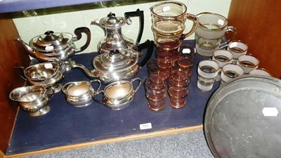 Lot 332 - A silver plated four piece tea service, a silver plated three piece tea service, a copper...