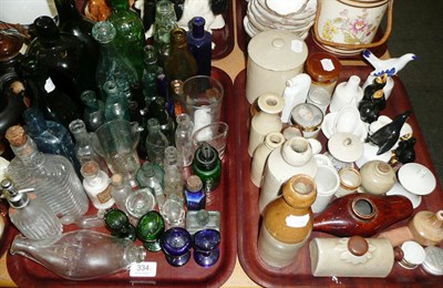 Lot 334 - Two trays of chemist bottles, pie funnels etc