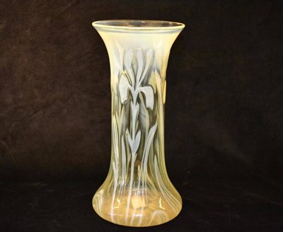 Lot 784 - An Art Nouveau Vaseline Glass Iris Vase, c.1900, moulded with three irises, unmarked, 33cm