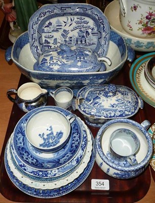 Lot 354 - A tray of blue and white pottery including Wedgwood 'Fallow Deer', sauce tureens, chamber pot, etc
