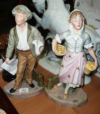Lot 382 - A pair of Victorian bisque figures of a boy and a girl
