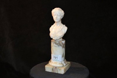 Lot 791 - Eugene Bernoud (French XIX-XXeme): A Carved Ivory Bust, modelled as a young lady with her hair tied