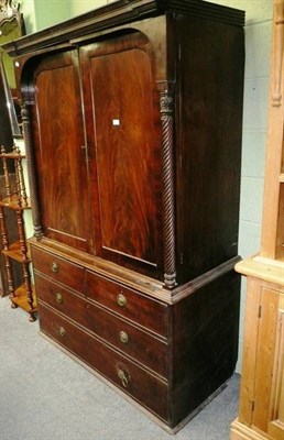 Lot 476 - An early 19th century mahogany linen press (cut down and altered)