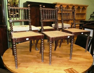 Lot 482 - Four bobbin turned chairs