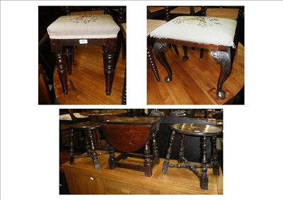 Lot 483 - Four stools and a small oak table