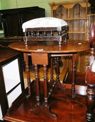 Lot 488 - A stool and a Sutherland table