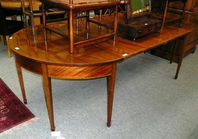 Lot 491 - D-end table with two leaves and support poles