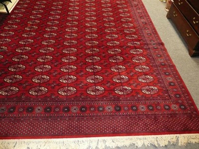 Lot 515 - Crimson carpet of Eastern design