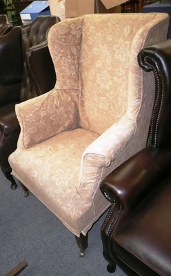 Lot 517 - Edwardian wing armchair