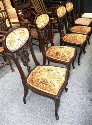 Lot 524 - A set of four late Victorian/Edwardian mahogany salon chairs