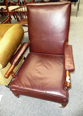 Lot 530 - Leather covered easy chair