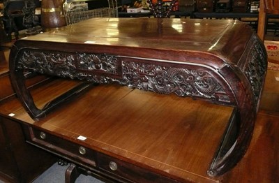 Lot 557 - Chinese carved hardwood low table