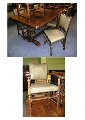 Lot 560 - Oak extending table and eight oak chairs (6 + 2)