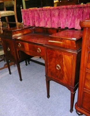 Lot 562 - An Edwardian mahogany, tulipwood banded and boxwood strung inverted breakfront sideboard, early...