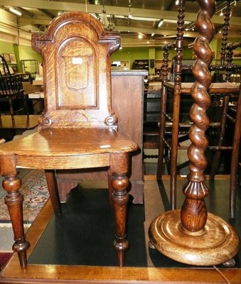 Lot 570 - Victorian carved oak hall chair and a standard lamp