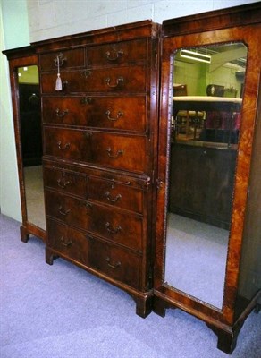 Lot 590 - Large walnut mirror door wardrobe