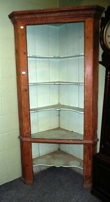 Lot 593 - Georgian pine corner cupboard