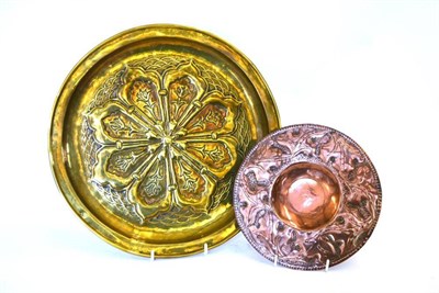 Lot 809 - A Keswick School of Industrial Arts Brass Circular Tray, repousse decorated with a stylised...