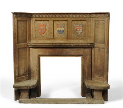 Lot 813 - A 1930's Robert  "Mouseman " Thompson Oak Fireplace, the top with egg and dart border above...