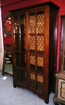 Lot 651 - Modern cabinet and stained mirror