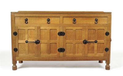 Lot 820 - A Robert  "Mouseman " Thompson Oak 5' Sideboard, with raised upstand, above two drawers, above four