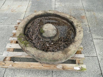 Lot 754 - A circular grinding stone, 82cm diameter x 7.5cm high