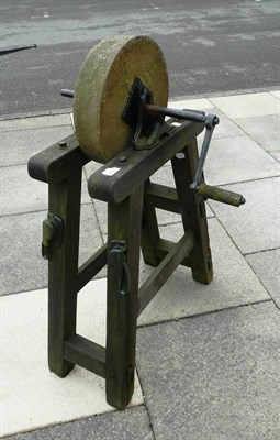 Lot 764 - A grinding wheel on an oak frame, wheel 34cm diameter