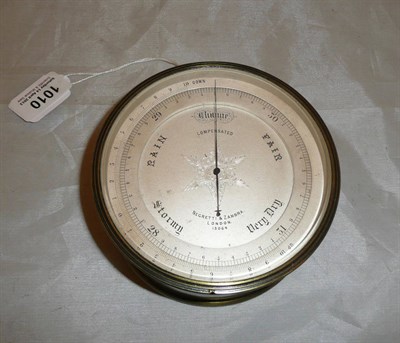 Lot 1010 - A Compensated Aneroid Barometer by Negretti and Zambra, London, serial number 13064, in brass case