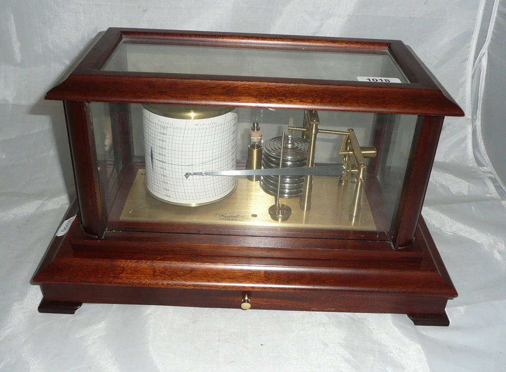 Lot 1018 - A Mahogany Cased Barograph by Russell of Norwich, with seven section vacuum, working clockwork...