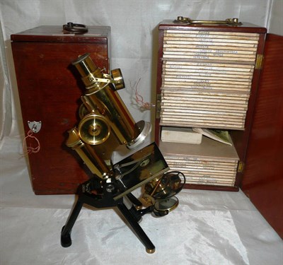 Lot 1027 - A Lacquered Brass and Black Enamelled Monocular Compound Microscope by J. Swift & Son, London, with