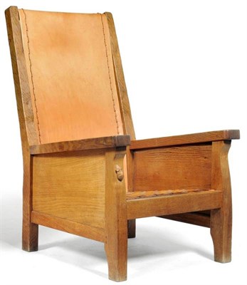 Lot 828 - A Robert  "Mouseman " Thompson Oak Smoker's Chair, with slung cow hide back and lattice seat,...