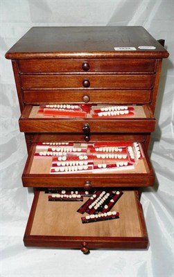 Lot 1039 - A Twelve Drawer Mahogany Specimen Chest, with hinged locking mechanism to the side, containing...