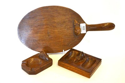 Lot 829 - A Robert  "Mouseman " Thompson Oak Cheese Board, with carved mouse signature on the board,...