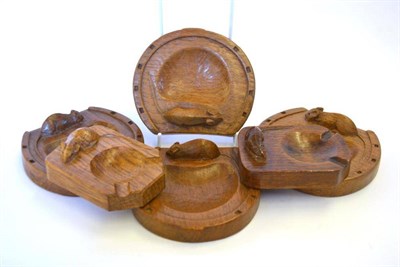 Lot 830 - Four Robert  "Mouseman " Thompson Oak Horseshoe Pin Trays, each with carved mouse signature,...