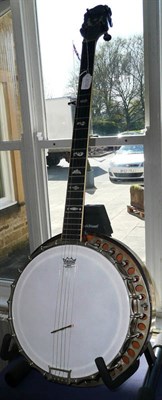 Lot 1080 - A Barnes & Mullins Five String G Banjo, stamped 'Barnes & Mullins, London', with 28cm head,...