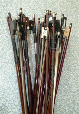 Lot 1106 - A Bundle of Twenty One Mixed Violin Bows, various sizes, weights and materials