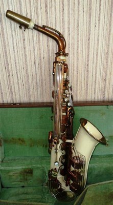 Lot 1132 - A Grafton Cream Coloured Plastic Alto Saxophone, serial number 10505, with clear plastic...