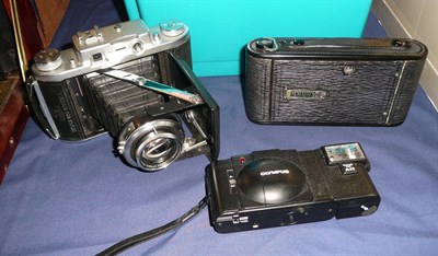 Lot 1166 - Three Cameras - Ross Ensign Selfix 820 Special, in stitched leather case, Kodak A-120...