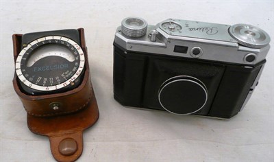 Lot 1173 - A Kodak Retina II (Type 142) Camera, in chrome with black leather trim, coupled rangefinder,...